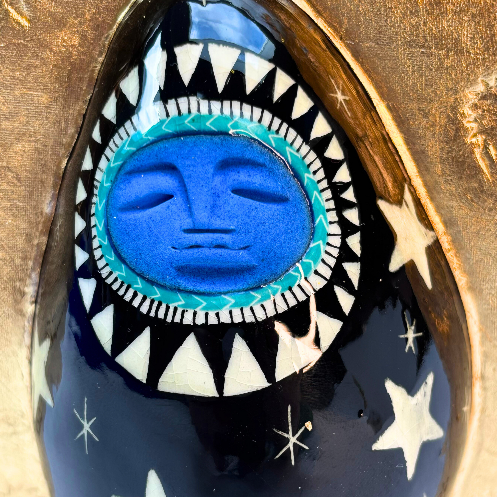 close up of peaceful goddess face in blue